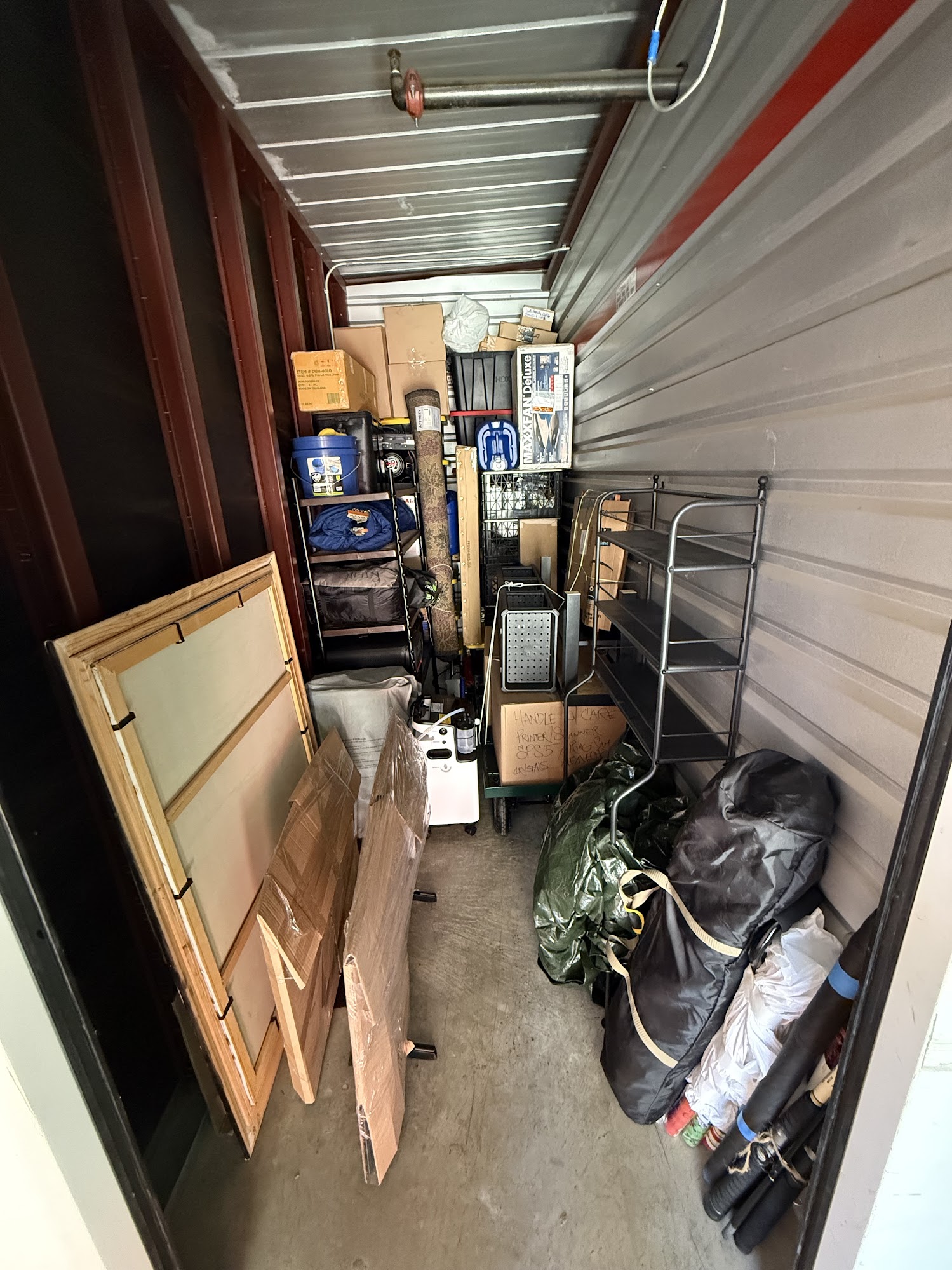 Crew maneuvering sofa safely through apartment stairwell in Lake Forest