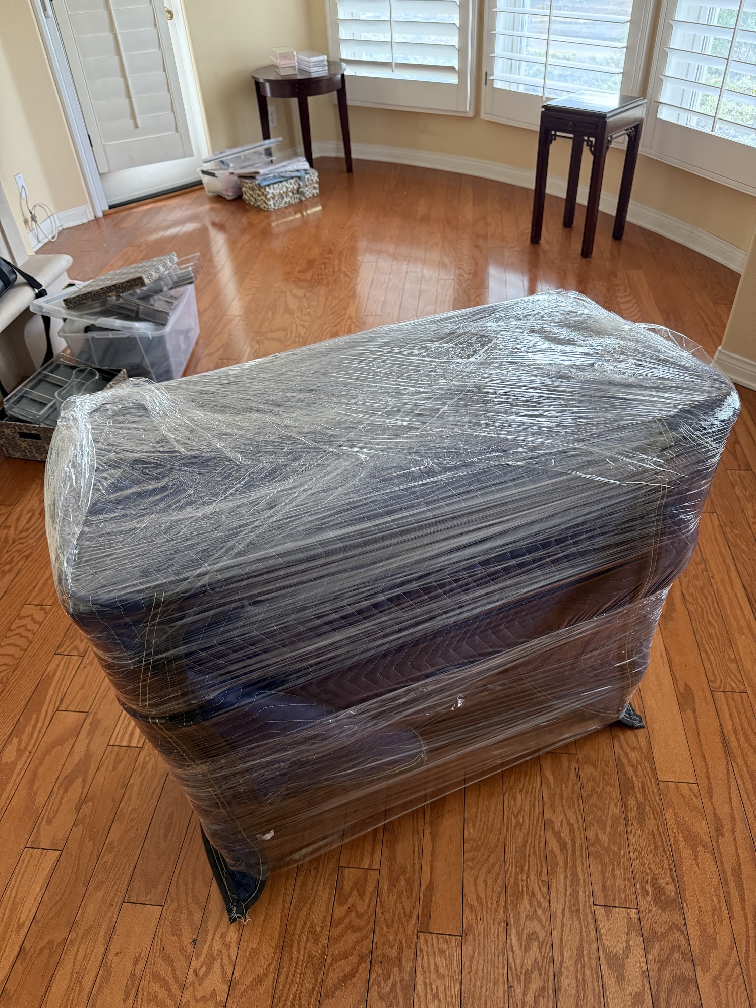 Bed frames disassembled and securely strapped inside moving truck in Aliso Viejo
