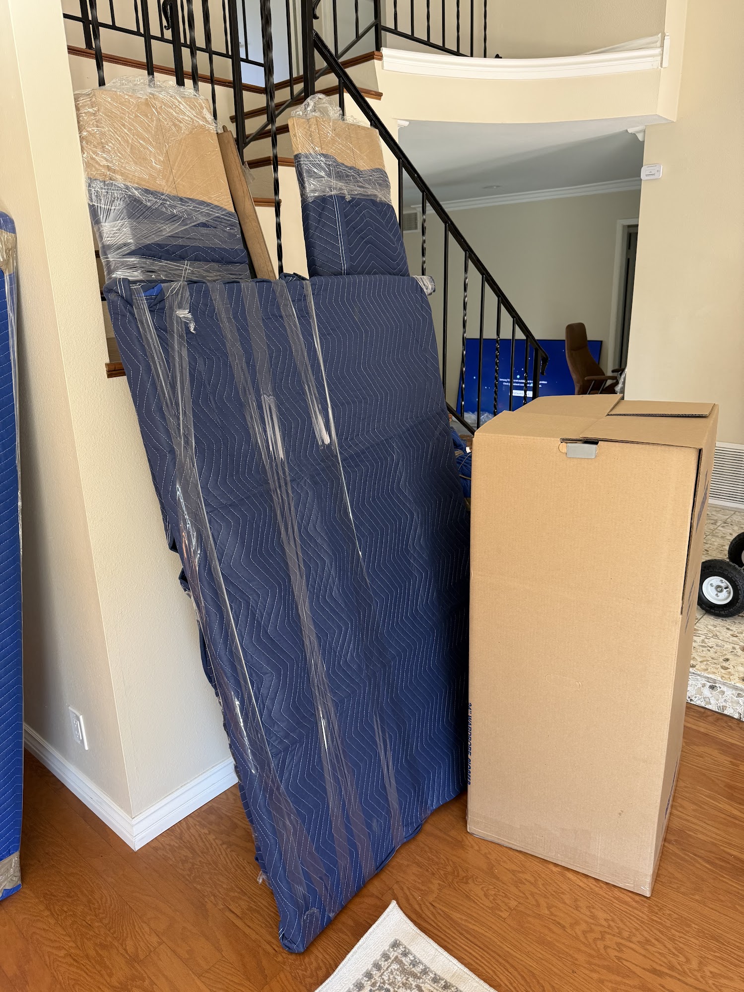 SMG Movers & Cleaning LLC handling heavy furniture during Anaheim move