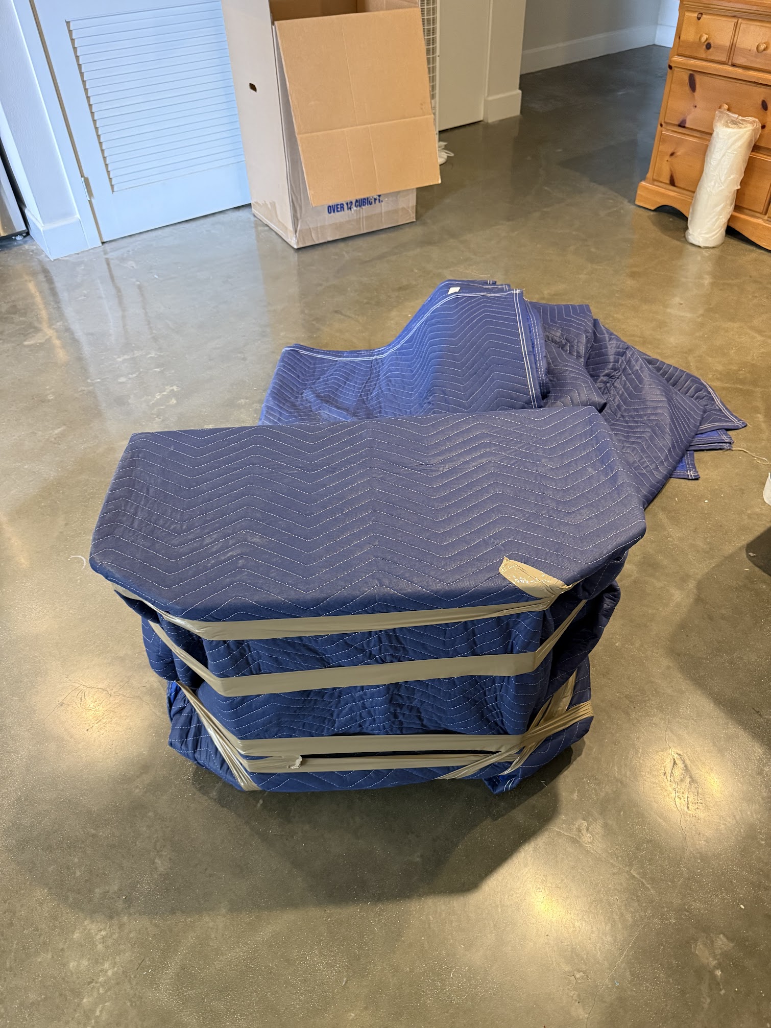 SMG Movers & Cleaning LLC handling heavy furniture during Anaheim move