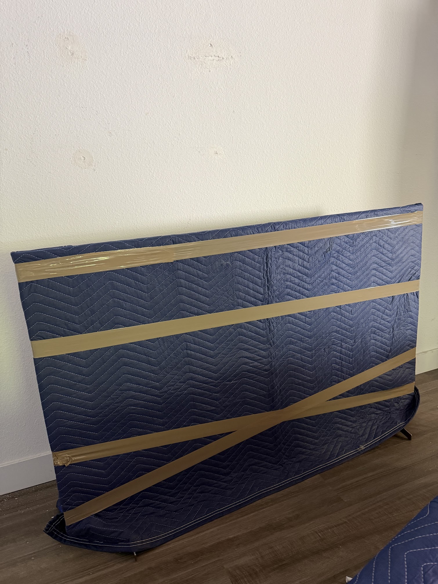 SMG Movers & Cleaning LLC handling heavy furniture during Anaheim move