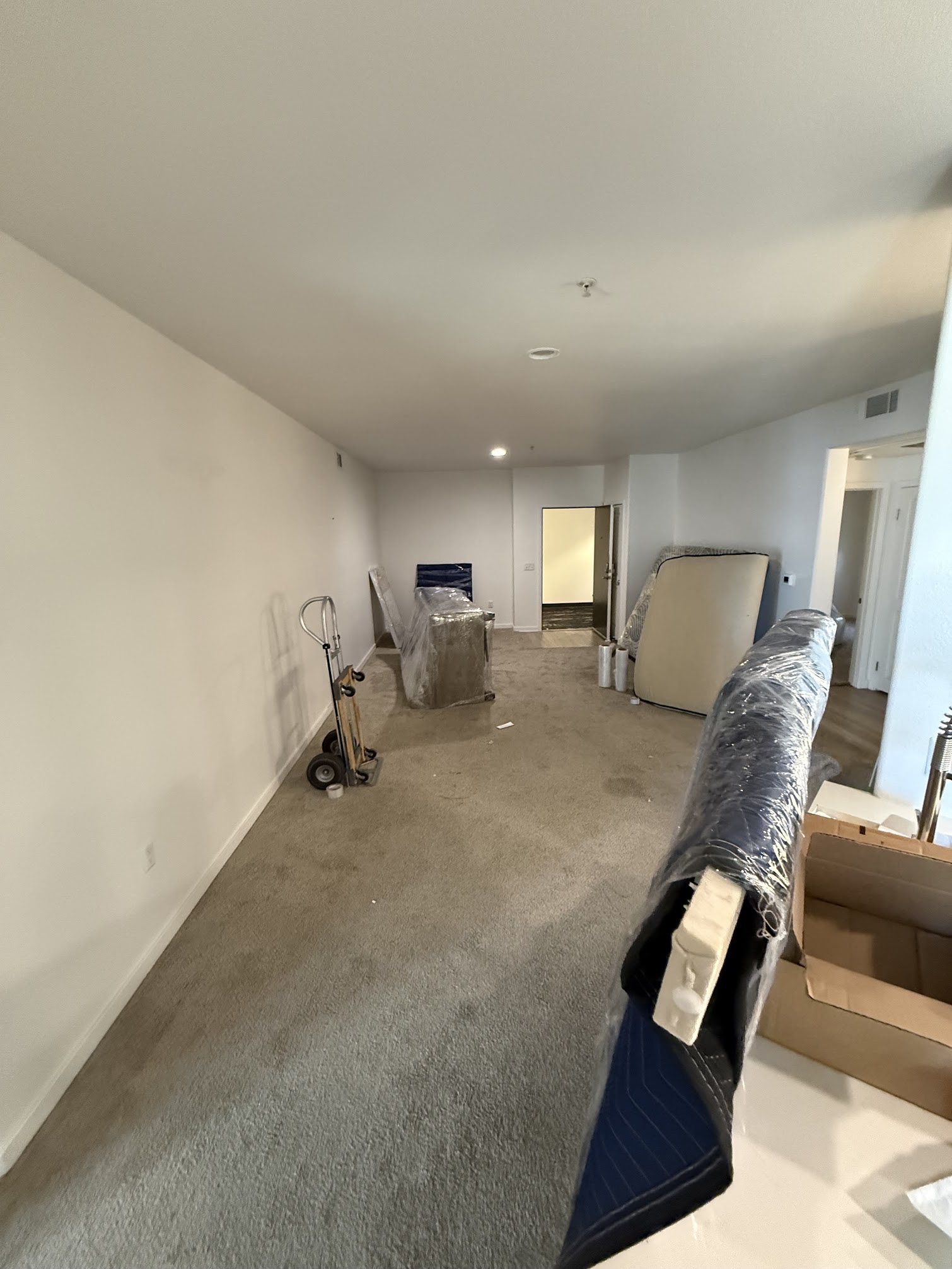 SMG Movers & Cleaning LLC handling heavy furniture during Anaheim move